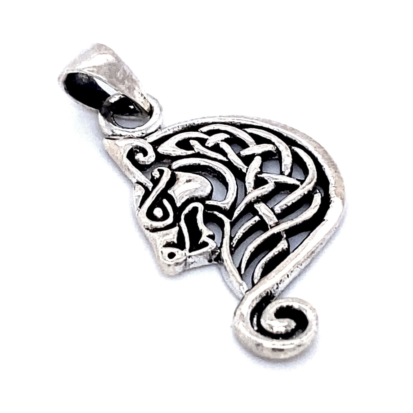 A sterling silver pendant featuring an intricate, stylized design of a dragon's head with hints of Celtic weave.