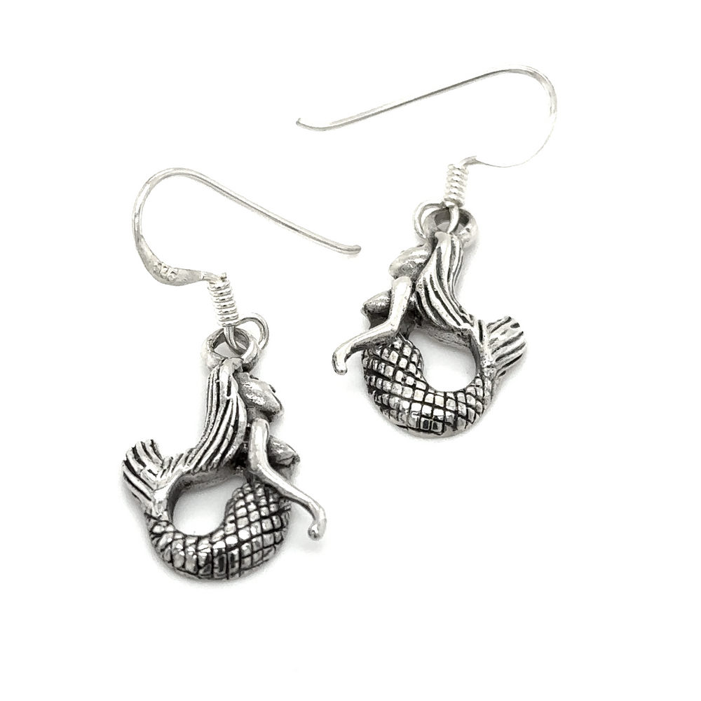 
                  
                    Handcrafted Super Silver Floating Mermaid Earrings on a white background.
                  
                