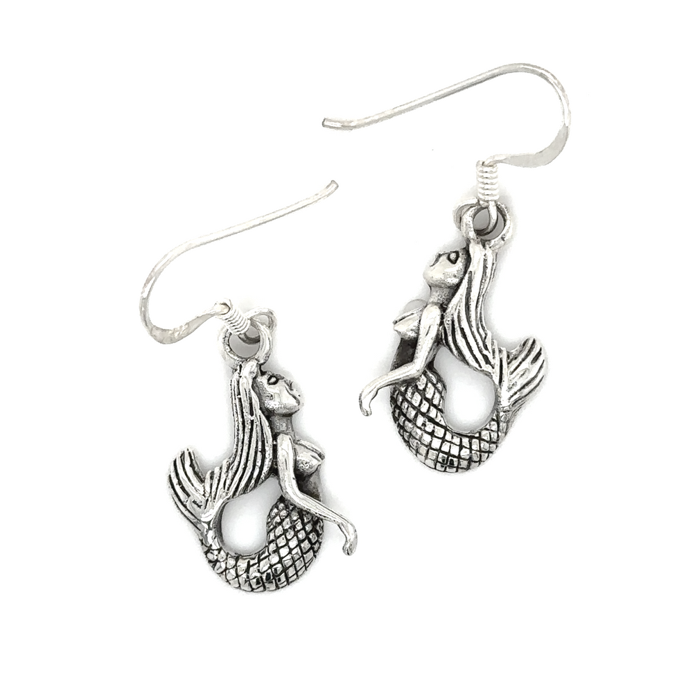 Super Silver's hand crafted Floating Mermaid Earrings on a white background.