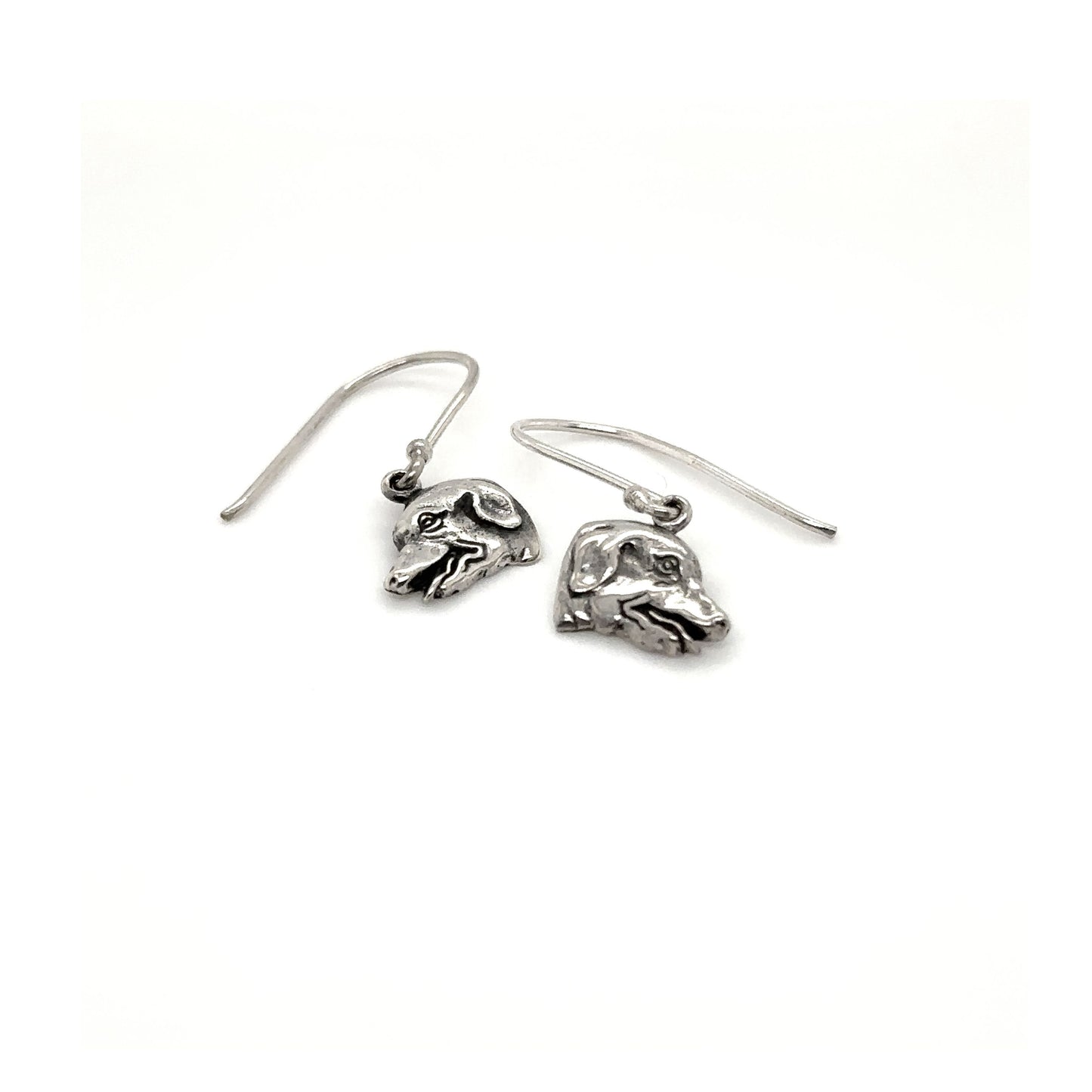 
                  
                    A pair of Dog Earrings from Super Silver with a skull on them.
                  
                