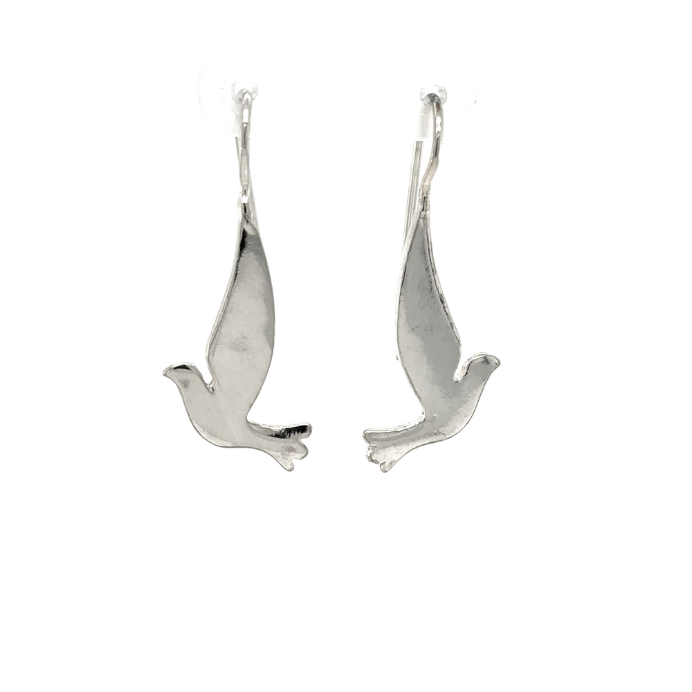 A minimalist masterpiece of Super Silver Dove Earrings, symbolizing peace, showcased on a white background.