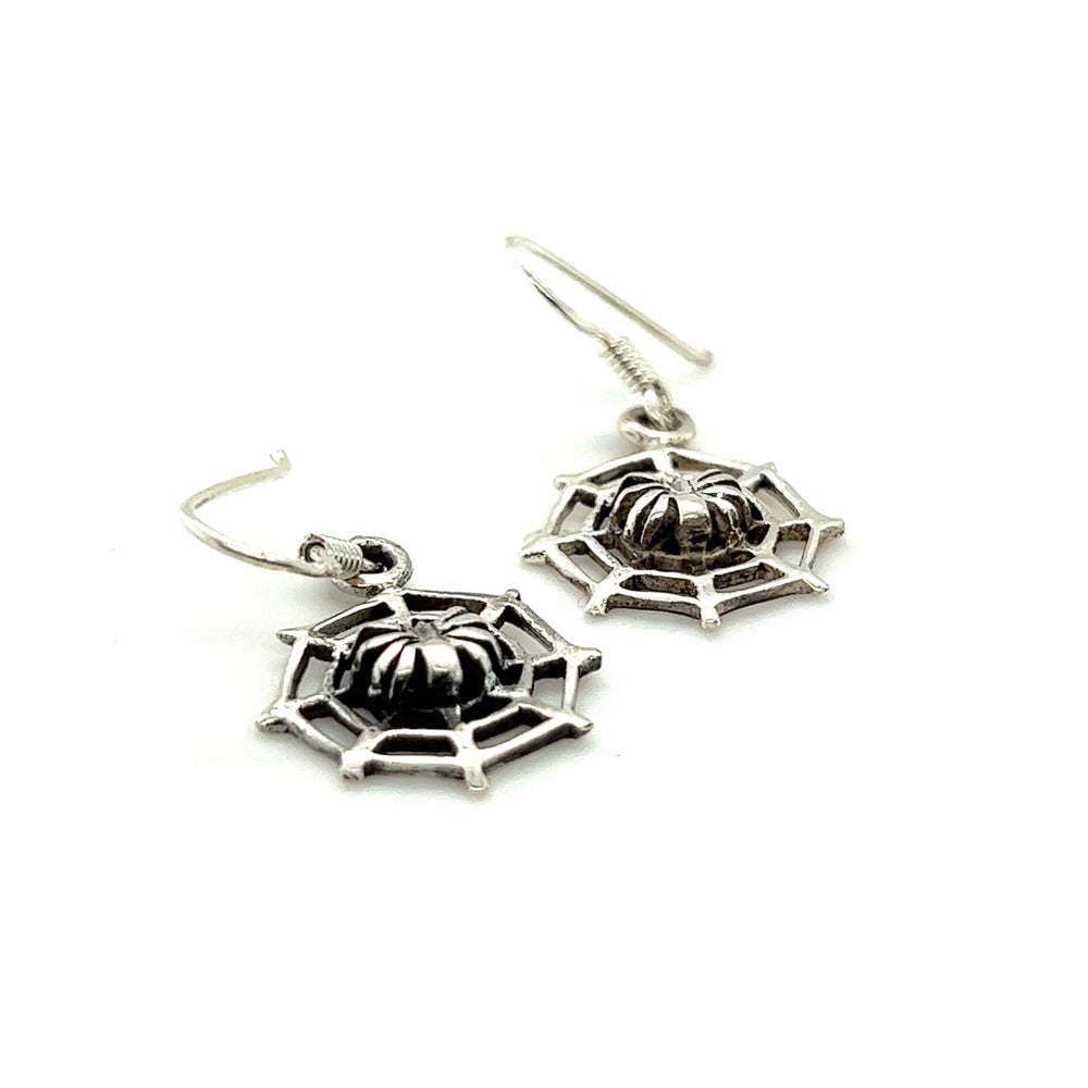 A pair of Super Silver Spider in Web Earrings, perfect for witches and occult enthusiasts, beautifully displayed on a clean white background.
