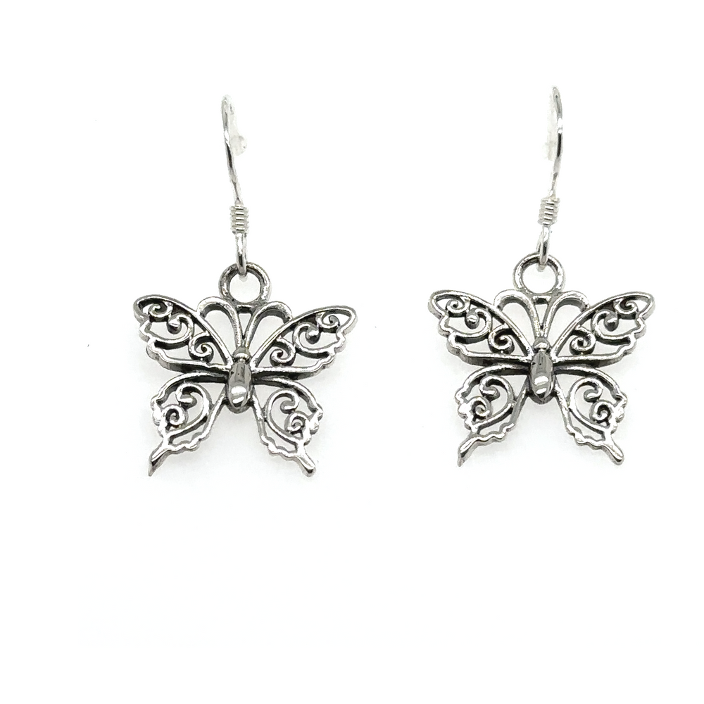 
                  
                    A pair of Super Silver Small Filigree Butterfly Earrings, showcasing a delicate filigree design, displayed against a clean white background.
                  
                