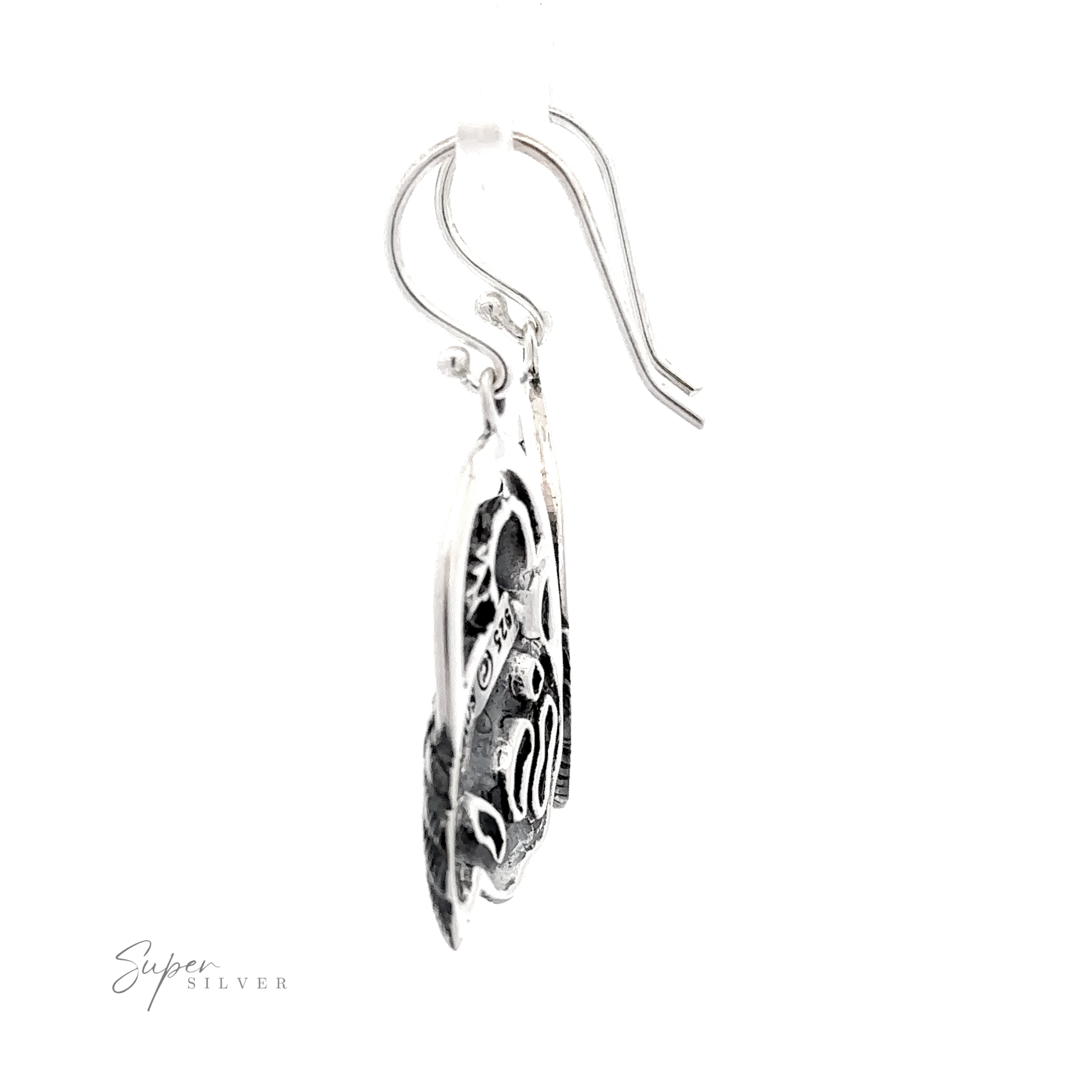 Detailed Raven Earrings with delicate patterns hanging from a hook, isolated on a white background.
