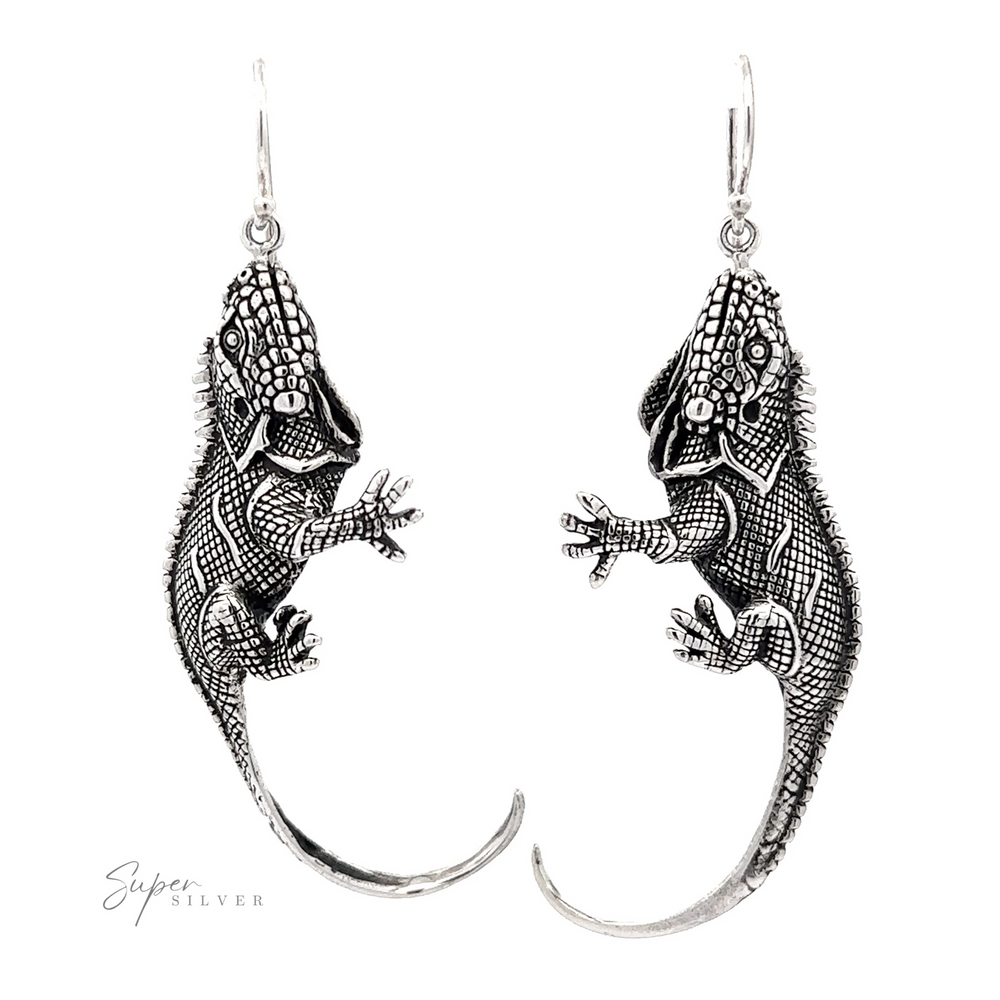 A pair of Statement Iguana Earrings with intricate detailing for reptile enthusiasts.
