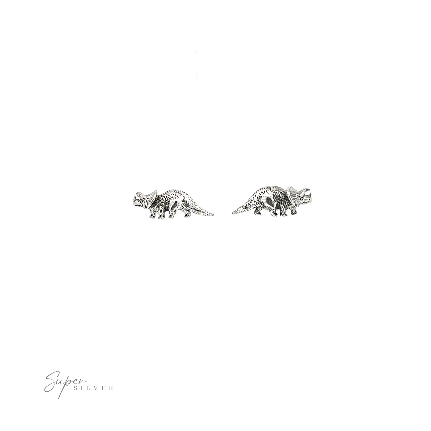 
                  
                    A pair of Triceratops Studs on a white background, making them a unique and prehistoric addition to any occasion.
                  
                