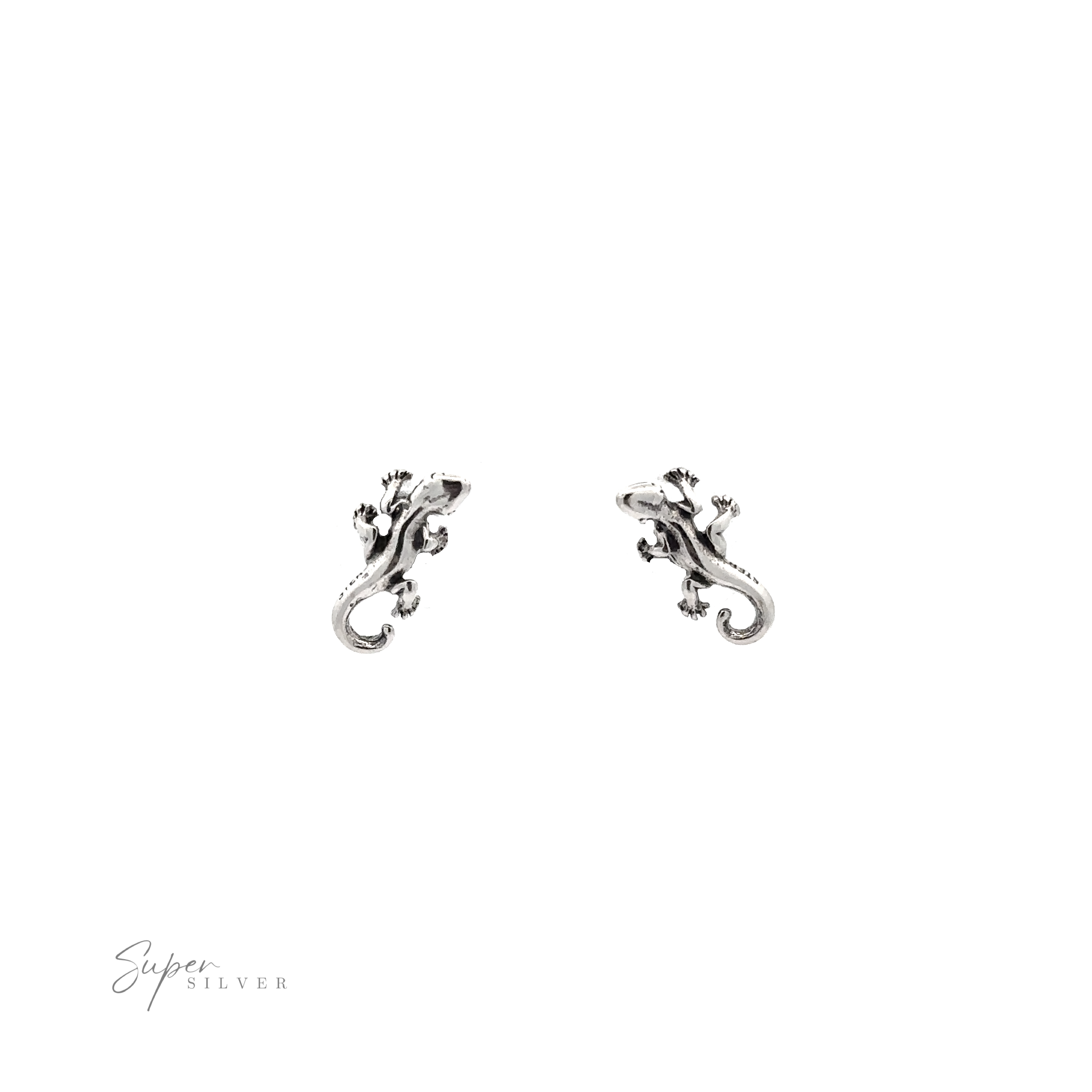 These Lizard Studs feature minimal detailing, crafted in silver for a stunning contrast against the white background.