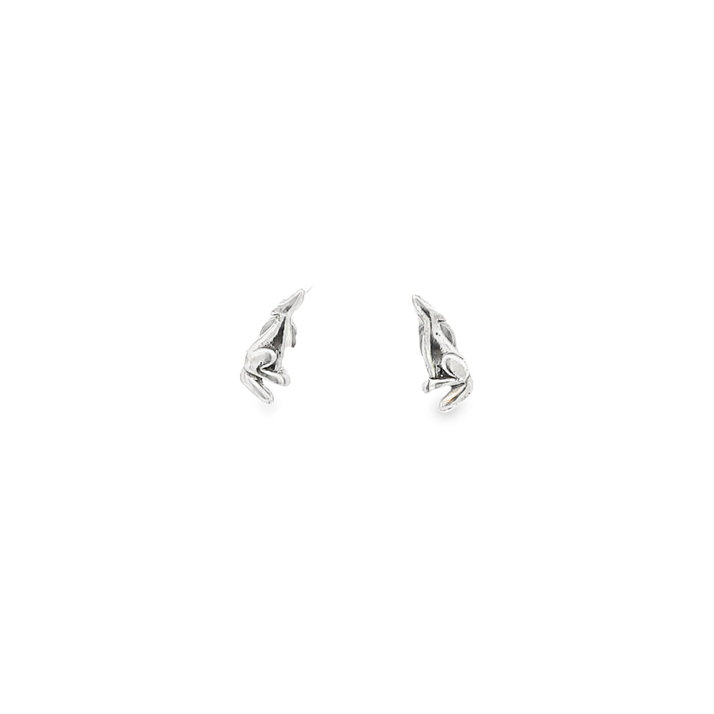 
                  
                    Southwest-styled .925 Sterling Silver Howling Wolf Studs on a white background.
                  
                