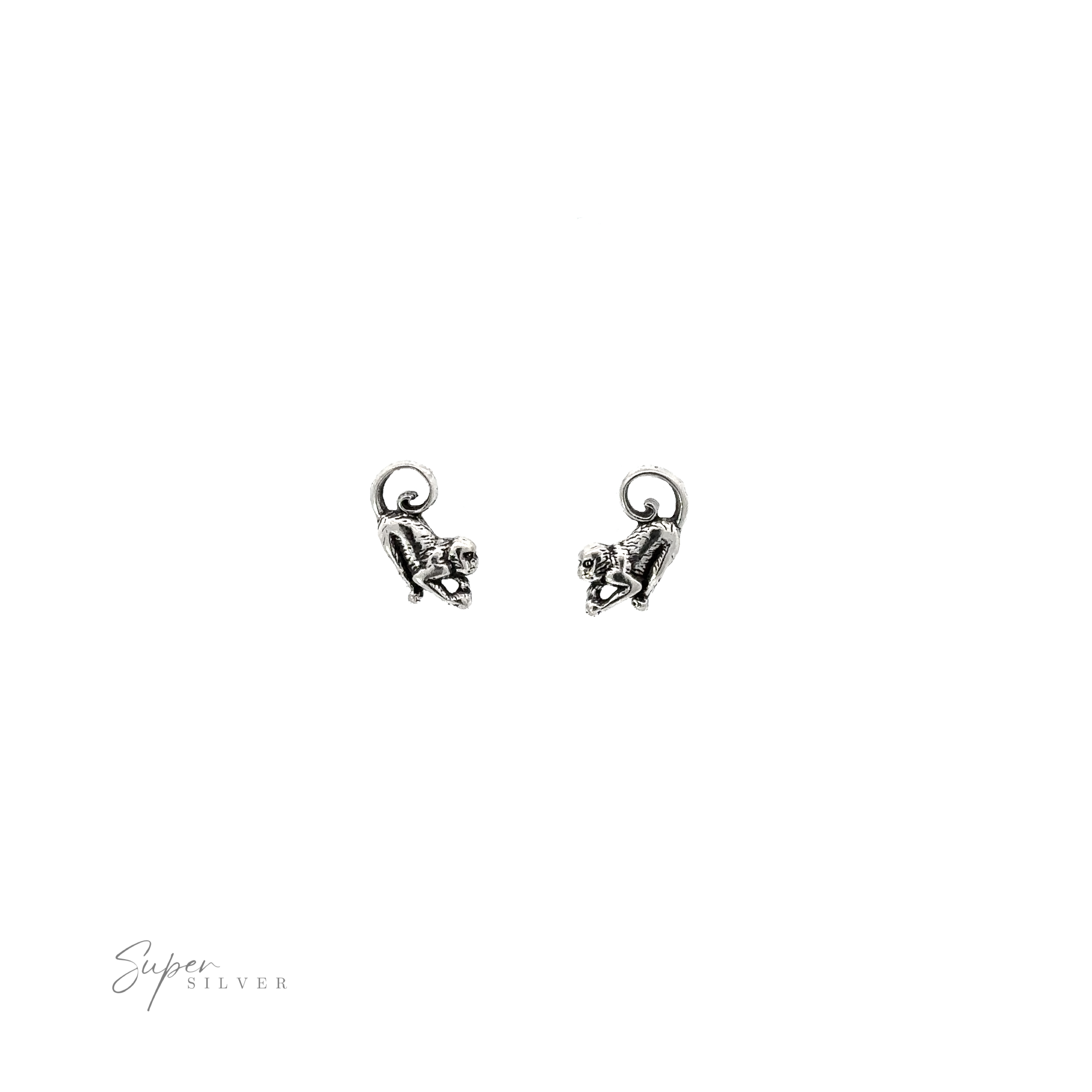 A pair of Monkey Studs on a white background.