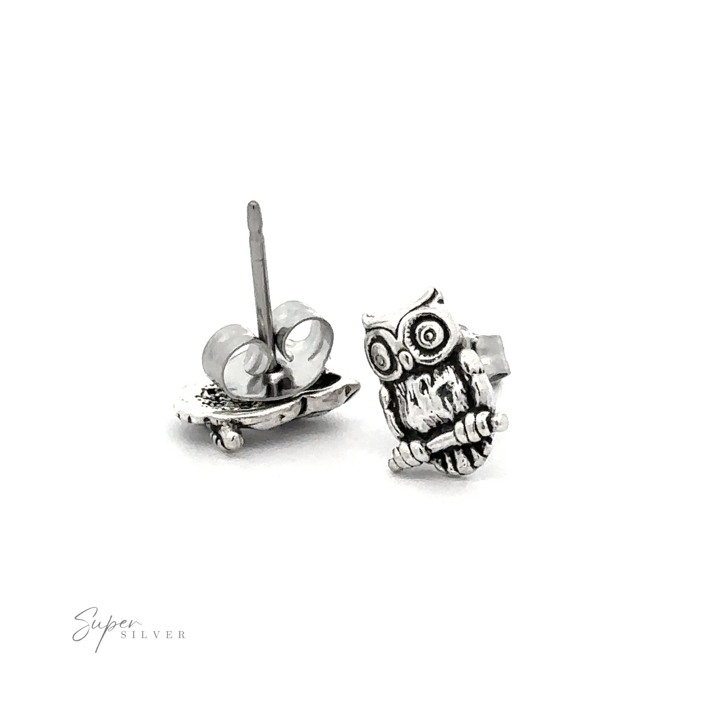 A pair of Owl Studs on a white background.