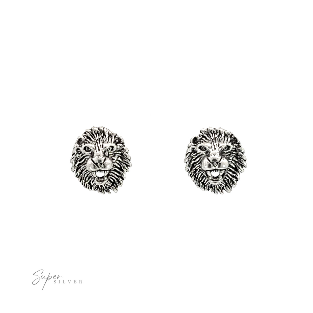 A pair of Lion Head Studs on a white background.