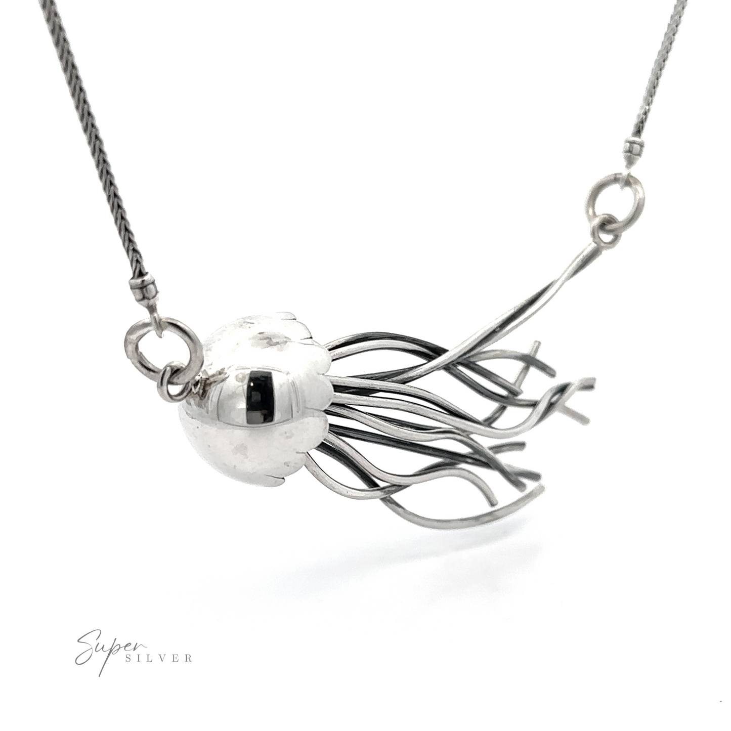 
                  
                    Jellyfish necklace featuring a spherical pendant encased in an abstract, branch-like sterling silver design, displayed against a white background with a signature "super silver.
                  
                