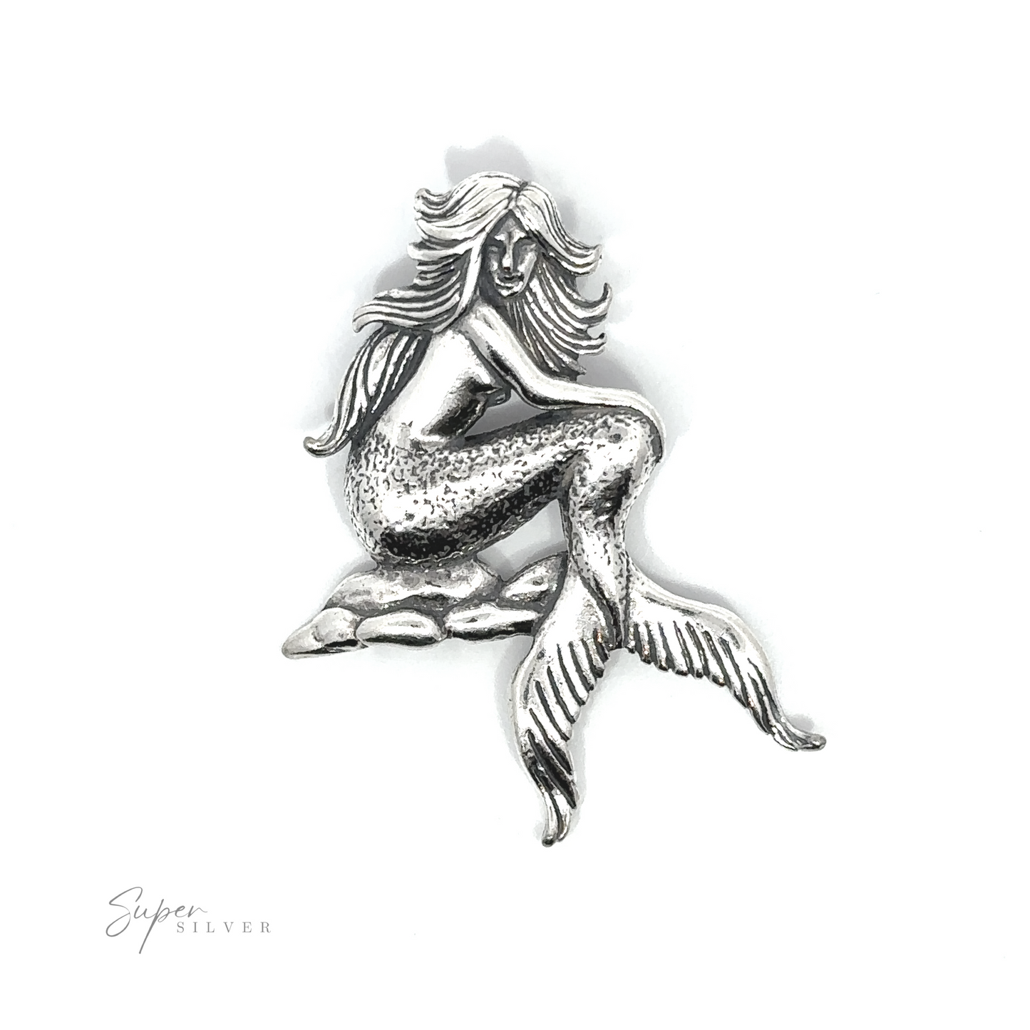 A captivating Seductive Mermaid Pendant featuring a stunning silver mermaid, gracefully perched on a rocky surface.