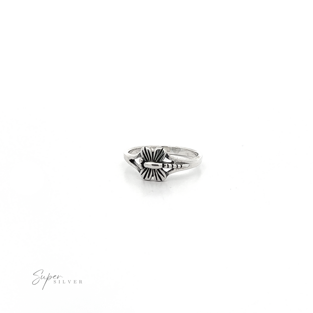 
                  
                    A Small Dragonfly ring .925 sterling silver ring with a delicate cross on it.
                  
                