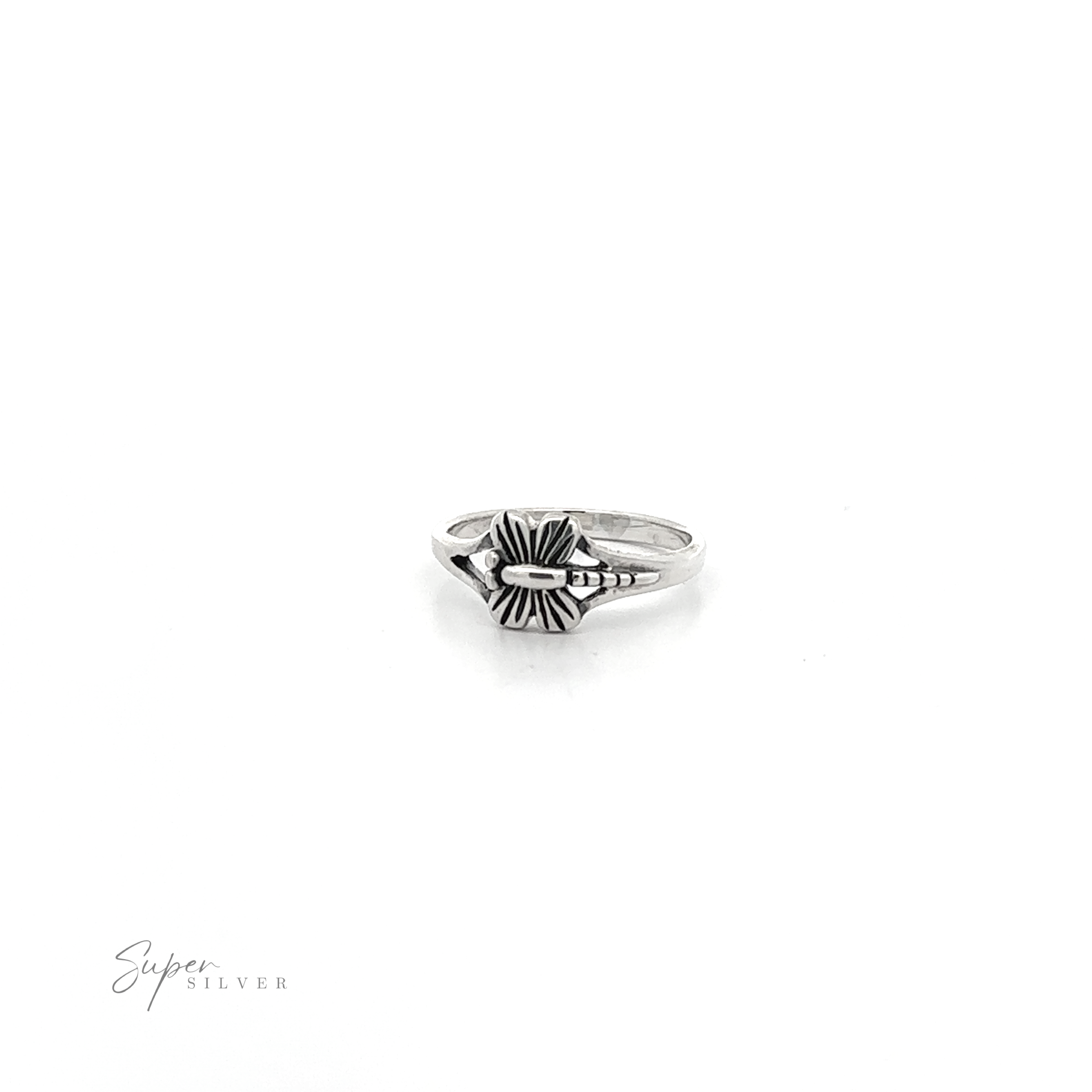 A Small Dragonfly ring .925 sterling silver ring with a delicate cross on it.