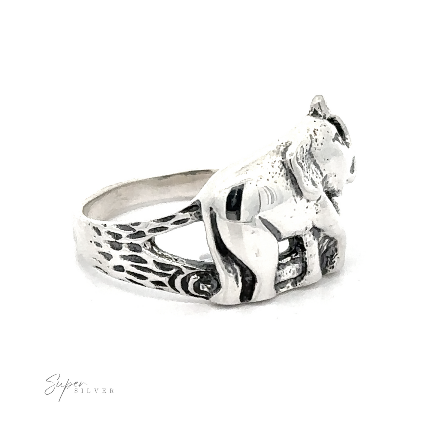 
                  
                    Elephant ring with textured antique look, considered a good luck ring, with decorative patterns on the .925 Sterling Silver band.
                  
                