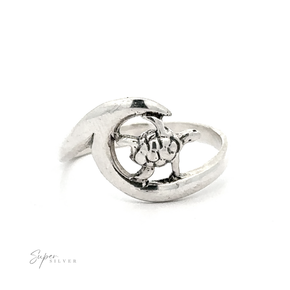 An Turtle And Ocean Wave Ring with a turtle on it.