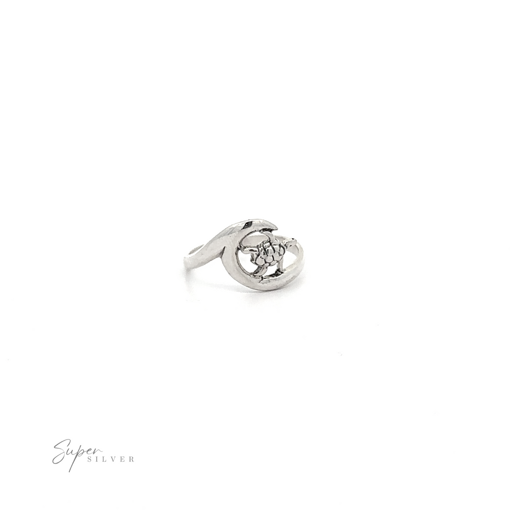
                  
                    A Turtle And Ocean Wave Ring with a diamond in the middle.
                  
                