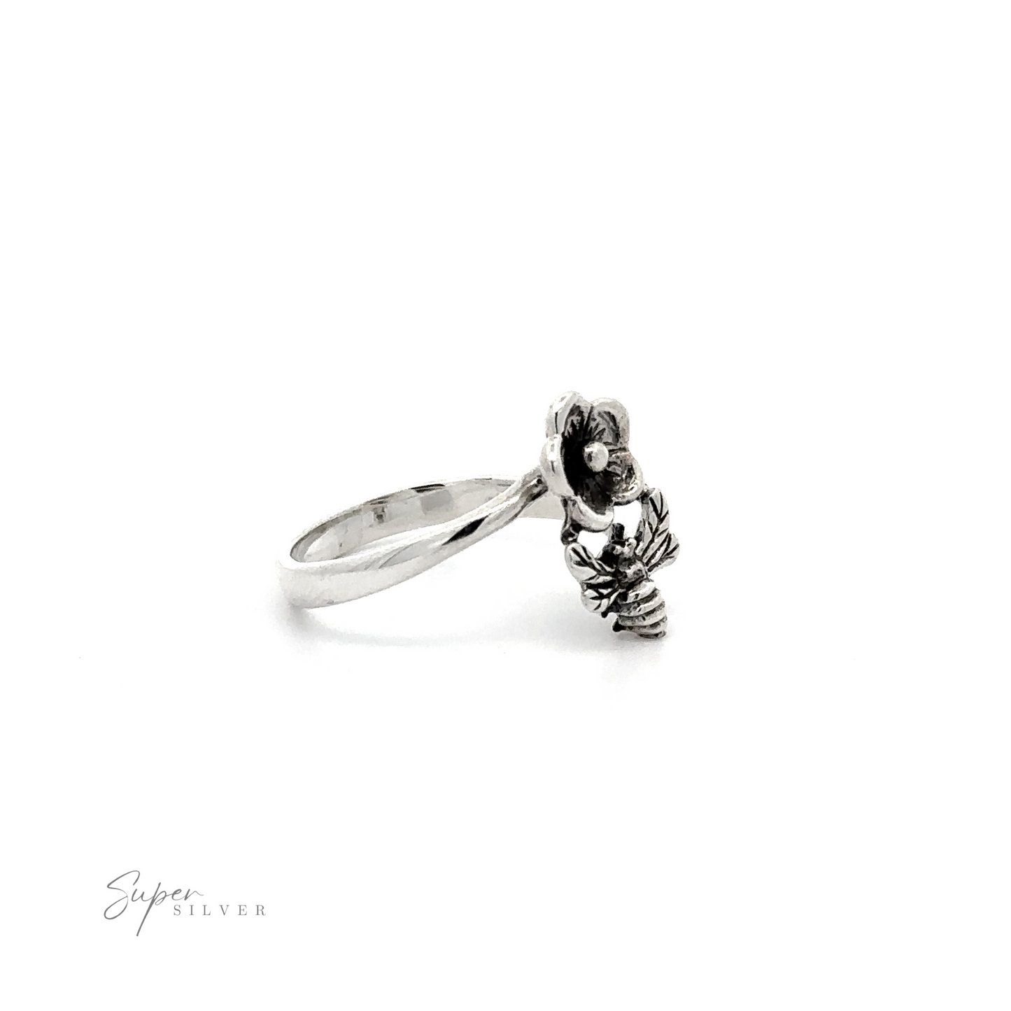 
                  
                    A Silver Bee and Flower Ring with a flying bee ornament.
                  
                