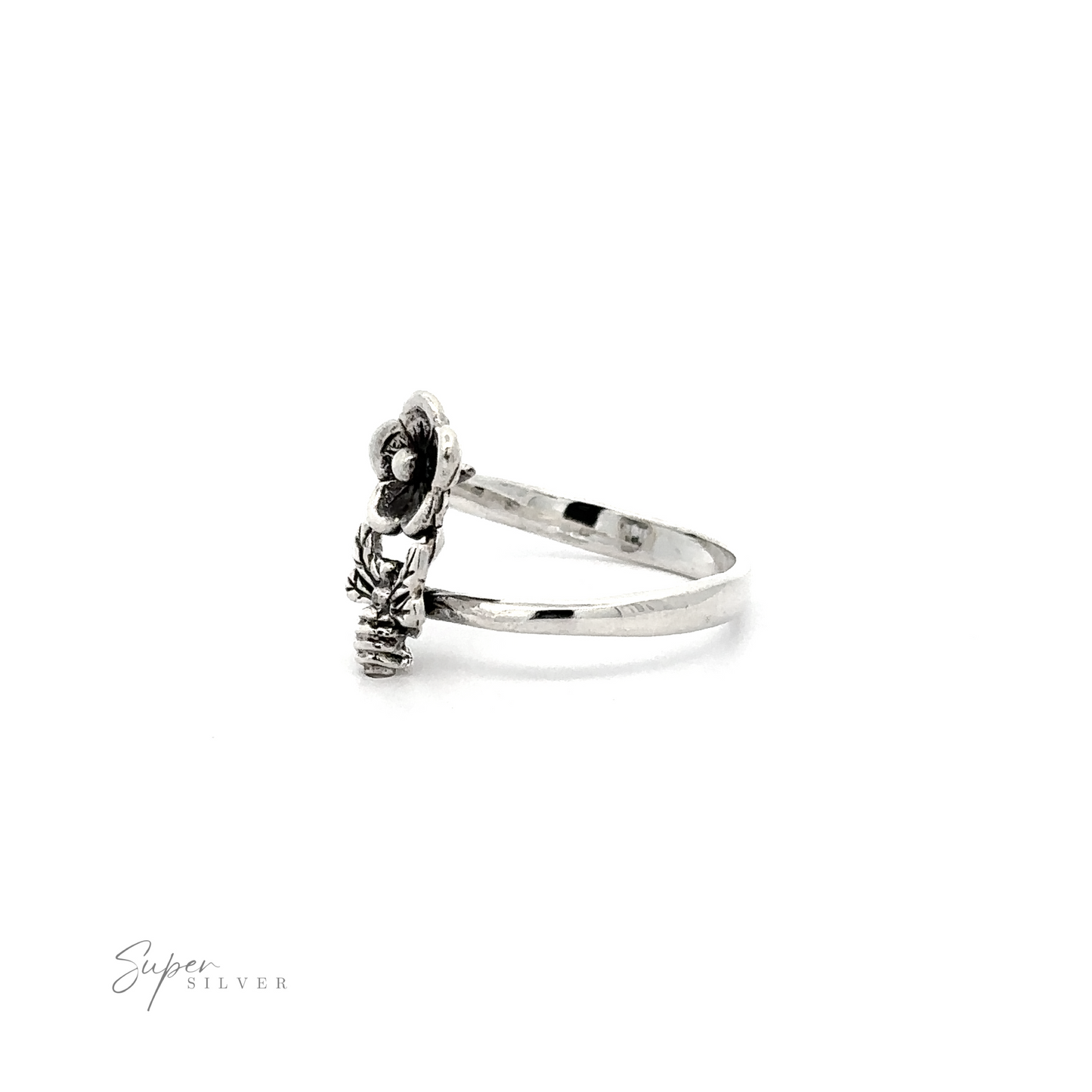 
                  
                    A Silver Bee and Flower Ring adorned with a skull and crossbones, perfect for nature lovers seeking a touch of edginess.
                  
                