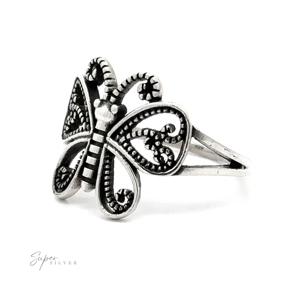 A Sterling Silver Butterfly Ring With Swirl Filigree Design.