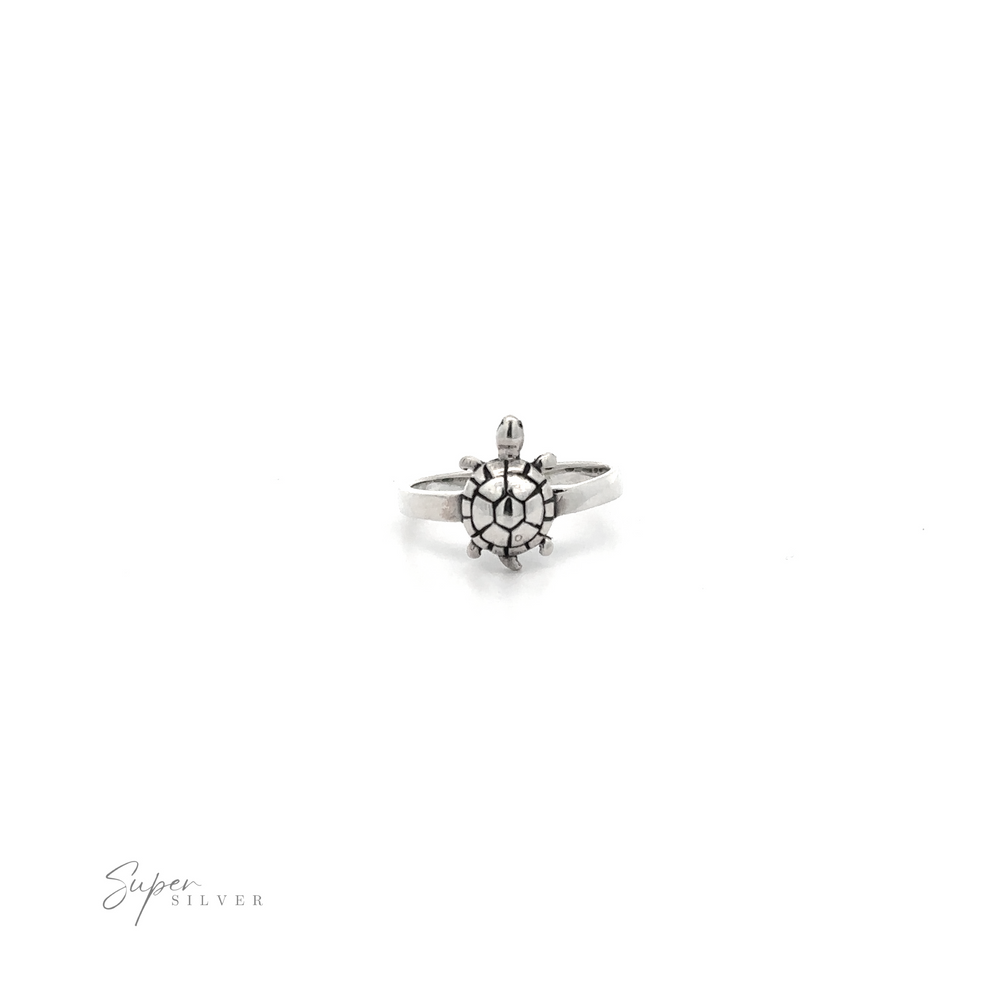 
                  
                    A cute turtle ring with a diamond in the center.
                  
                