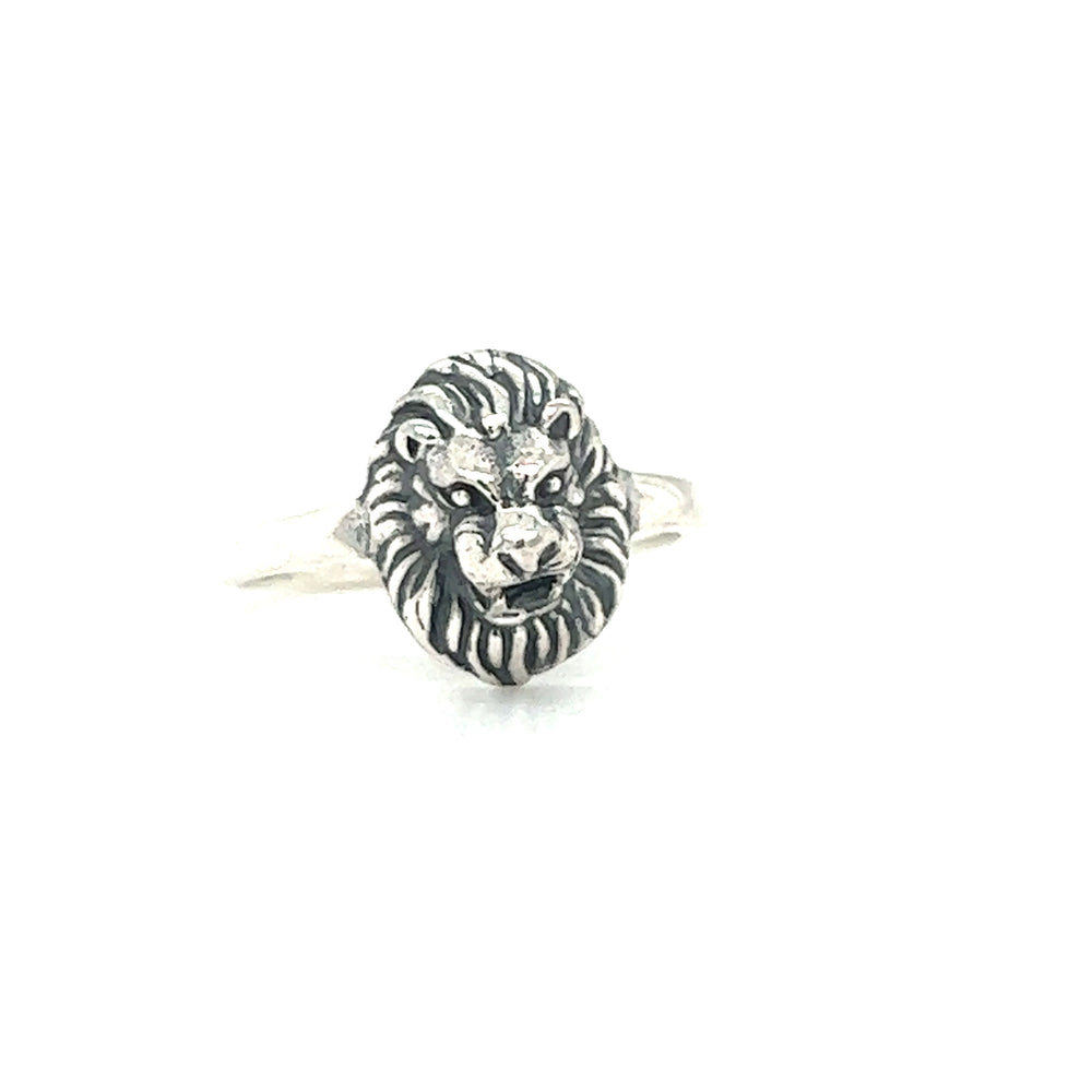 
                  
                    A small silver Lion Face Ring by Super Silver, exuding authority.
                  
                