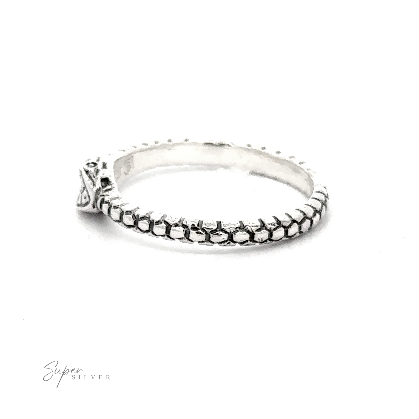 
                  
                    Ouroboros Ring with intricate detailing and a clear gemstone set in a decorative mount on a white background.
                  
                