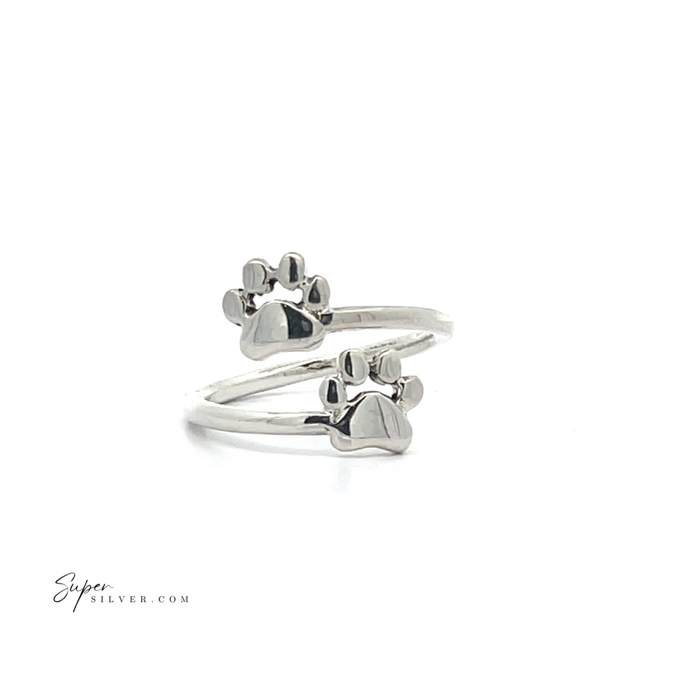 
                  
                    Paw Print Adjustable Rings: A set of two sterling silver rings with charming paw print designs, ideal for pet lovers, showcased on a white background.
                  
                