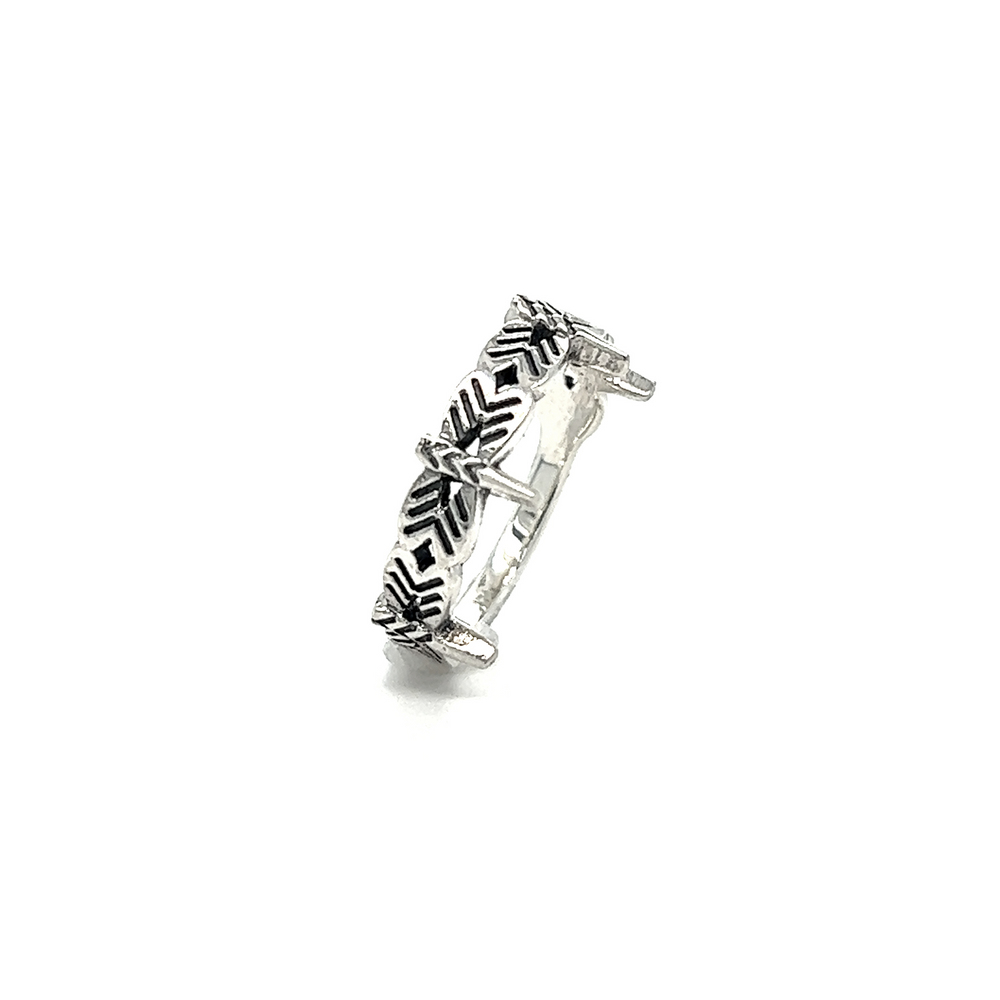 
                  
                    A Dragonfly Band with intricate black and white designs, symbolizing change and rebirth.
                  
                