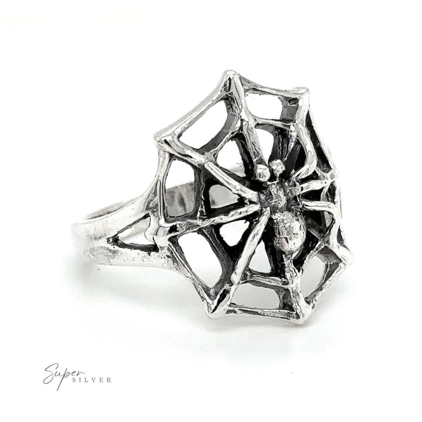 A sterling silver Spider on Web ring on a white background.