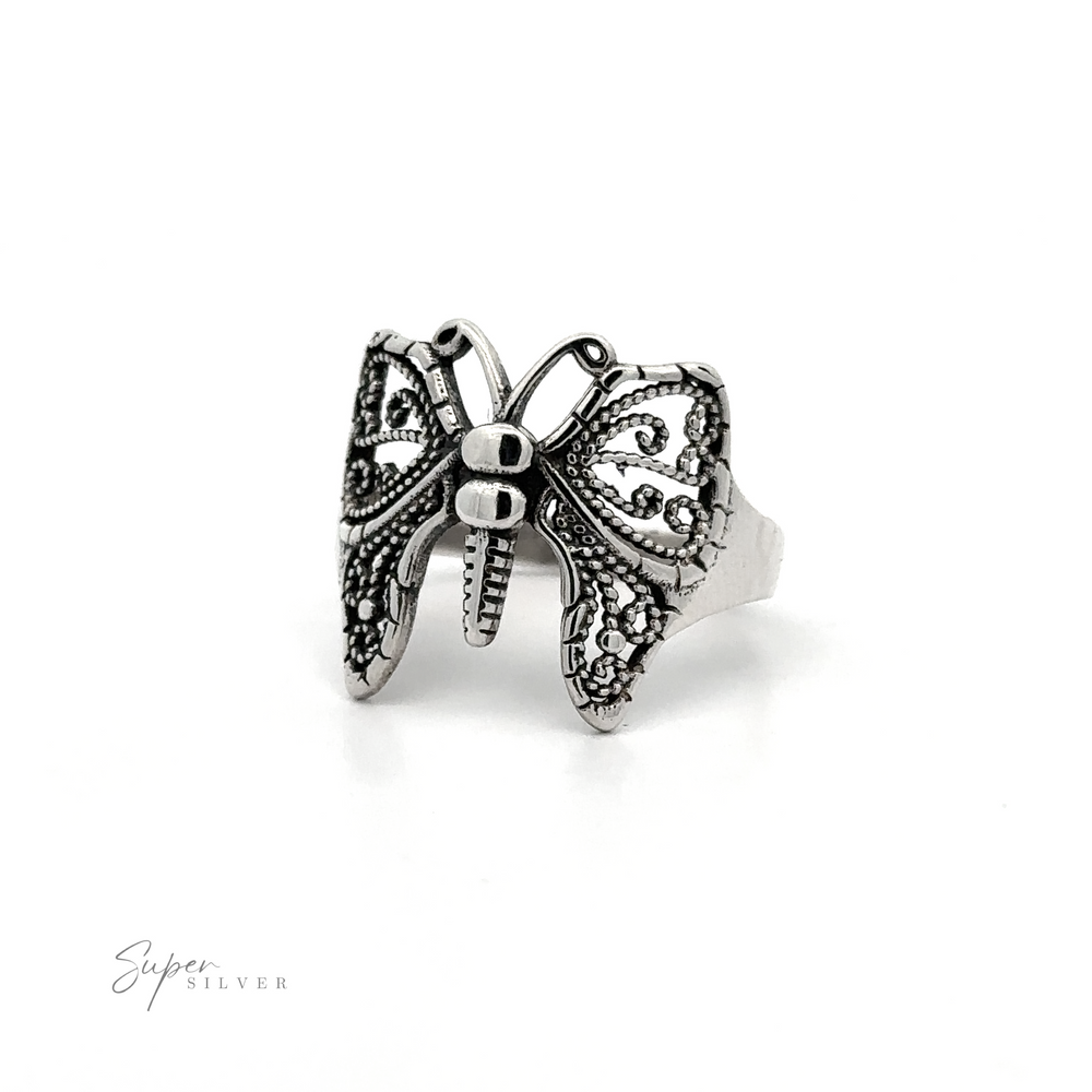 A Beautiful Butterfly Ring With A Wide Band on a white background.