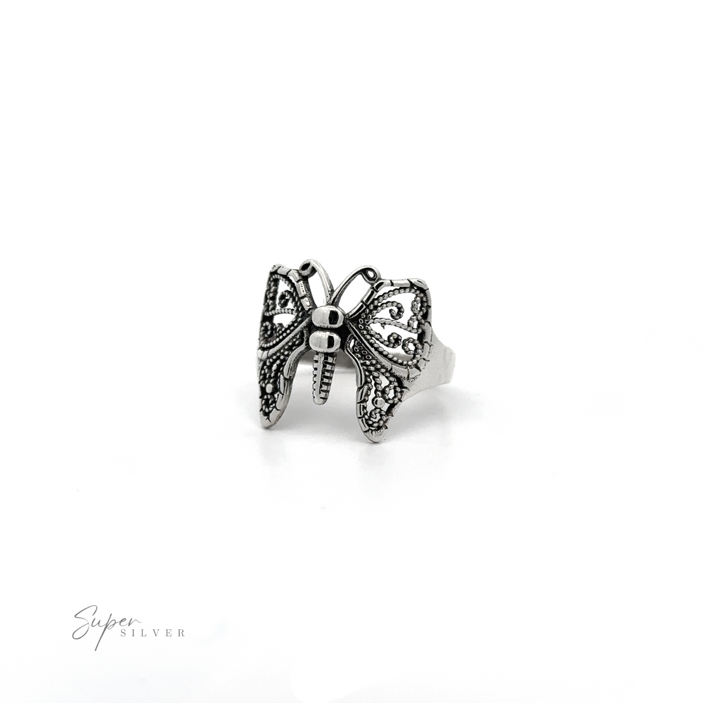 
                  
                    A Beautiful Butterfly Ring With A Wide Band on a white background.
                  
                