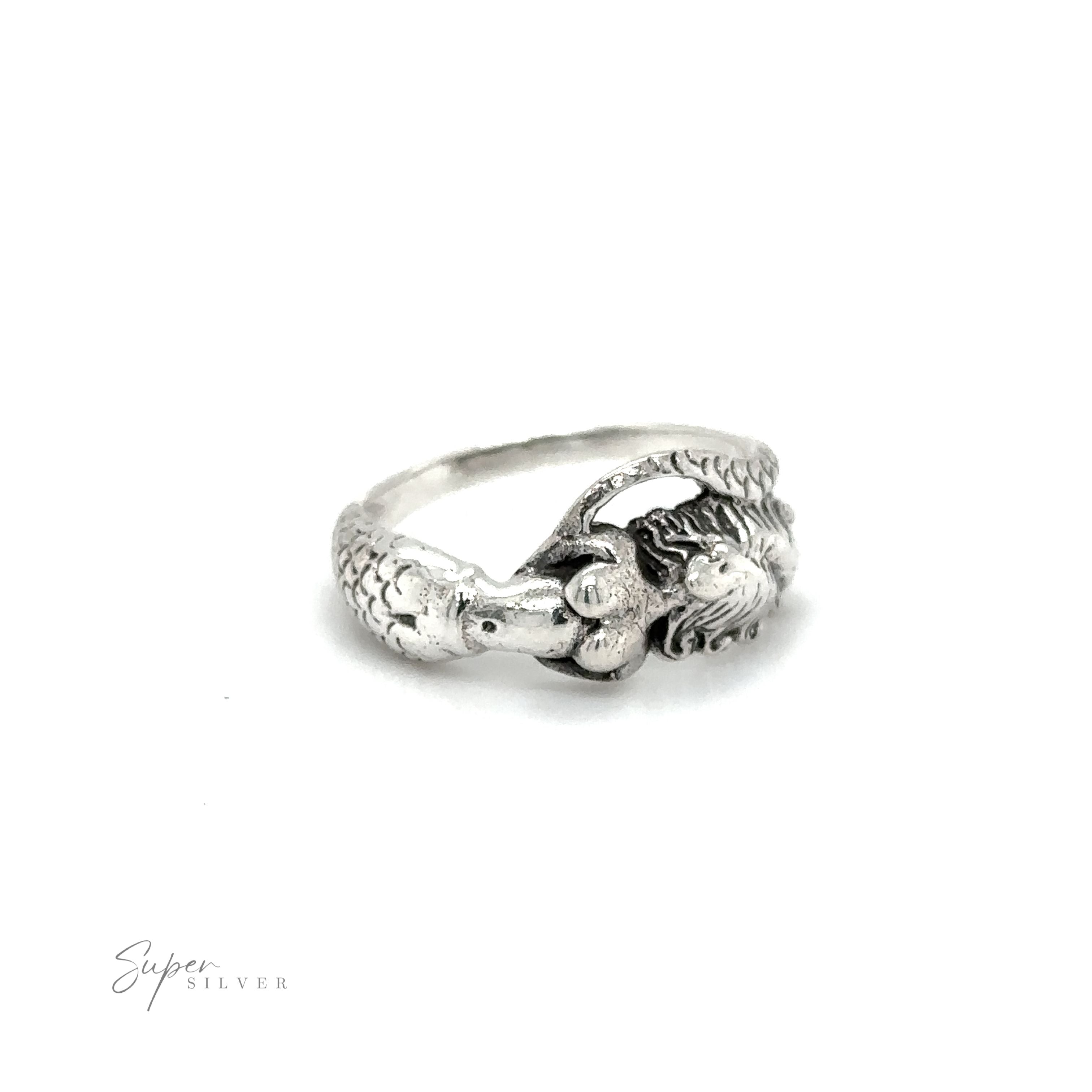 A mesmerizing Mermaid Ring with Swirly Tail adorns this exquisite silver ring, bringing the enchantment of the ocean to your fingertips.