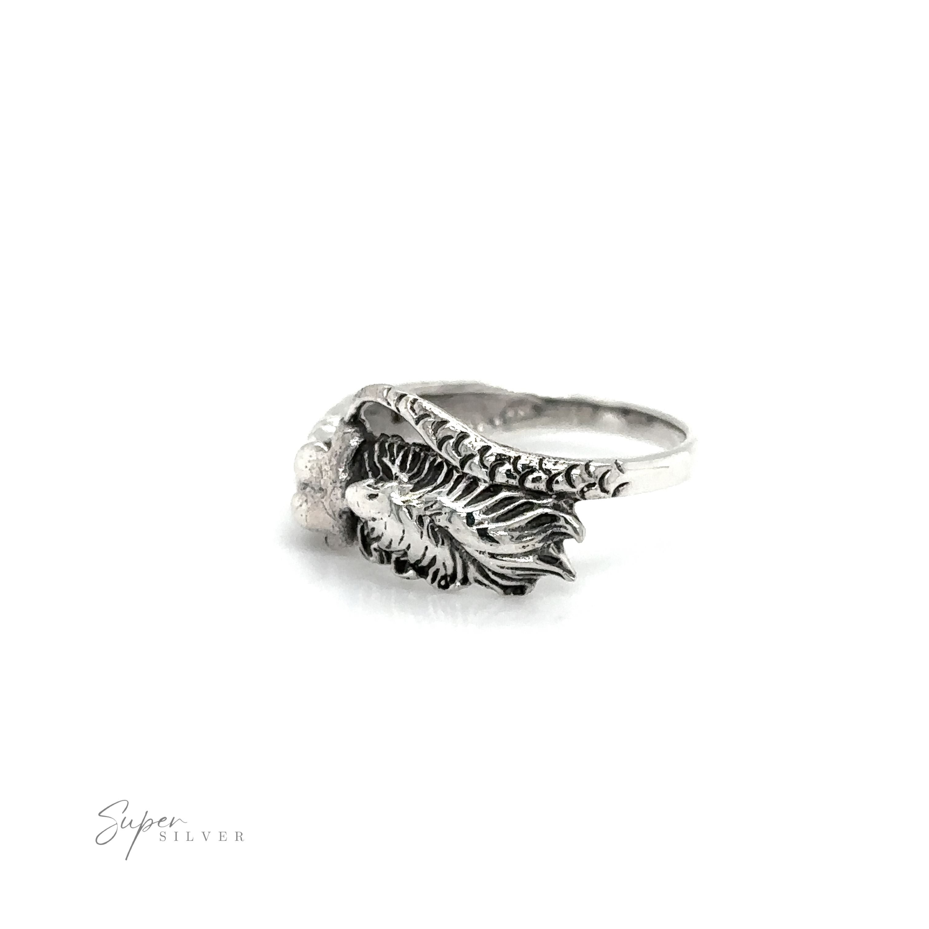 A silver Mermaid Ring with Swirly Tail with an intricate ocean-inspired design.