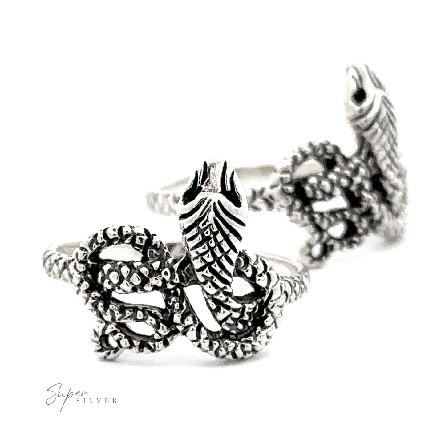 Twisted Snake Ring with intricate scale and wing details, adorned with small gemstones on tail and spine, photographed on a white background.