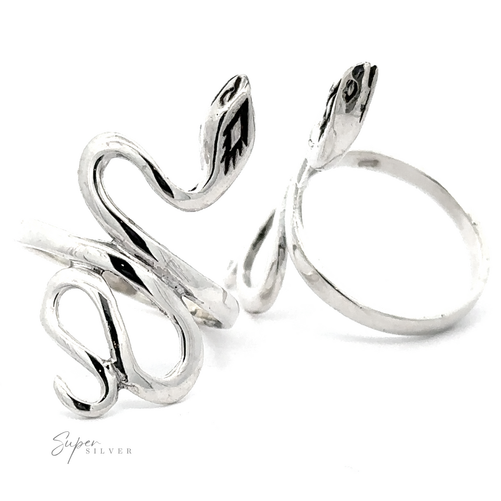 Two Coiled Snake Rings With Fine Finish with intricate designs on a white background, one shaped like a coiling snake and the other with the snake head prominent.