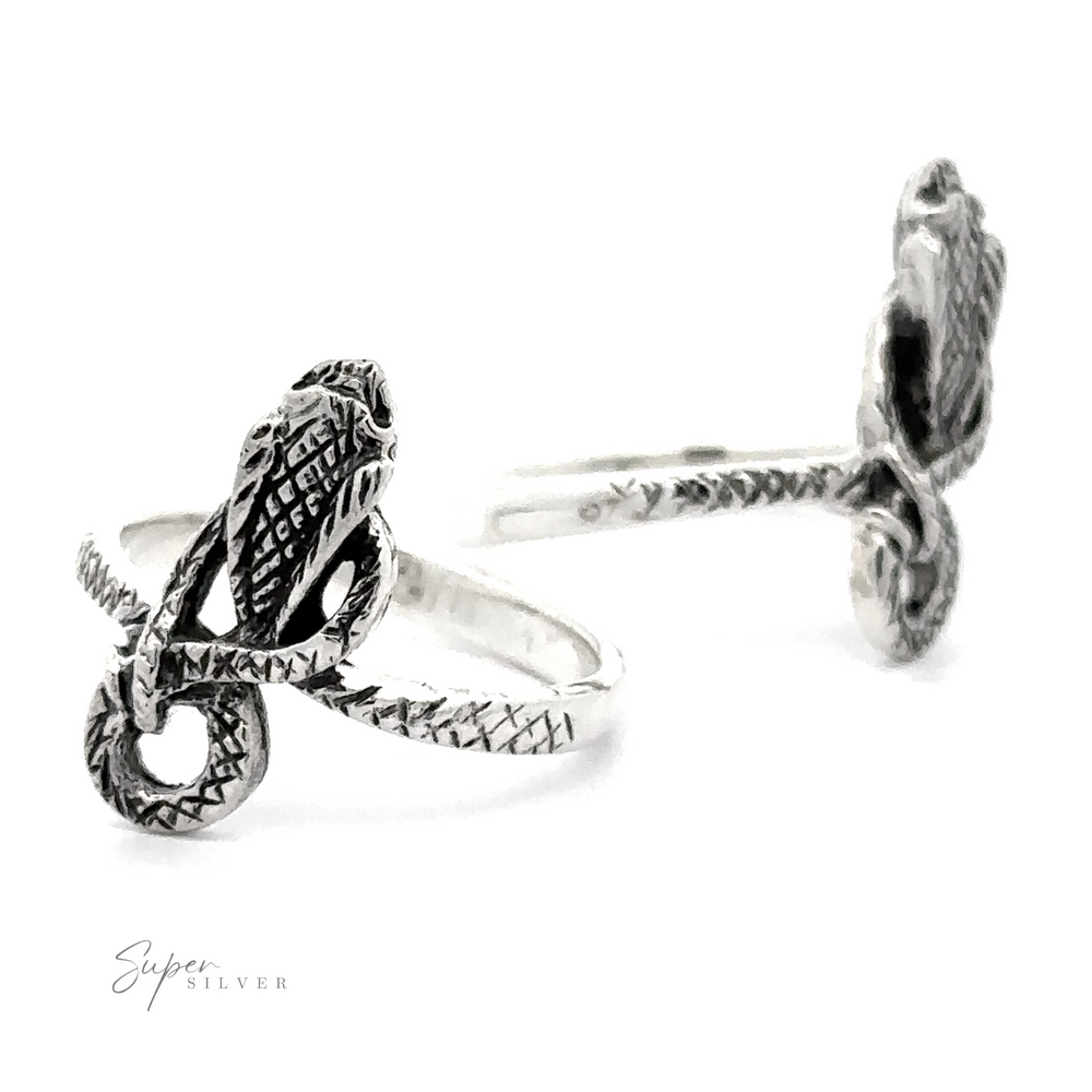 Coiled Cobra Snake Ring designed with intricate scale details and wrapped tail, showcased against a white background.