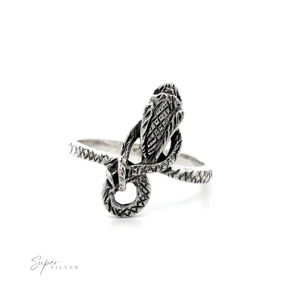Silver Coiled Cobra Snake Ring on a white background.