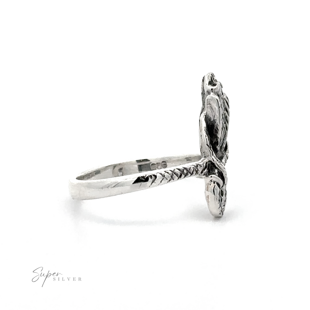 
                  
                    Coiled Cobra Snake Ring featuring intricate scale textures, displayed against a white background.
                  
                