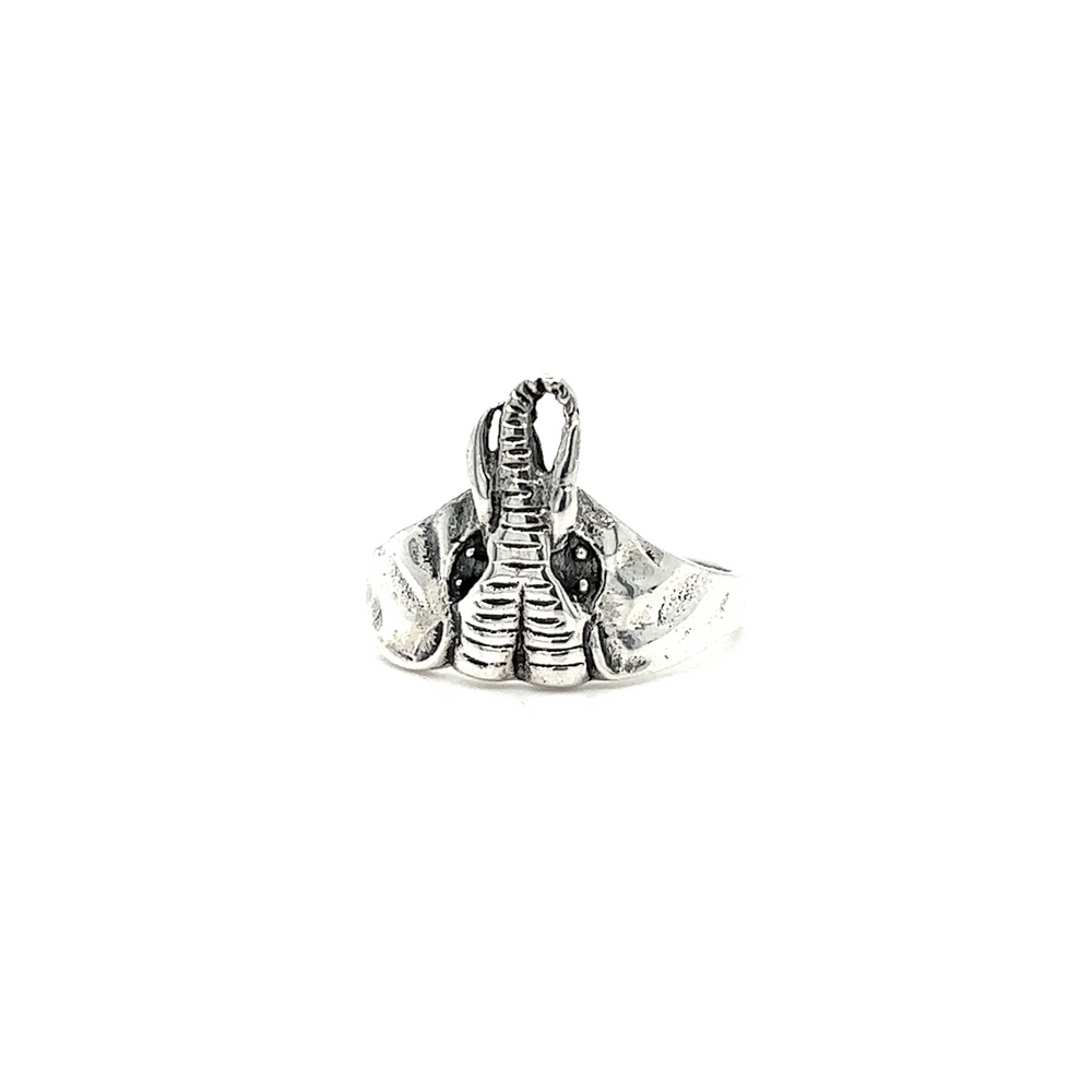 A Charming Elephant Head Ring with a snake on it.