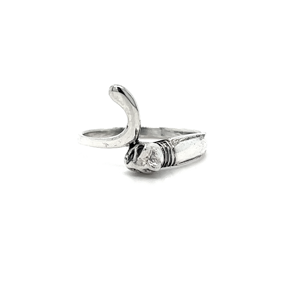 A Wrap-Around Cat Ring with a diamond in the middle, offering protection for cat lovers.