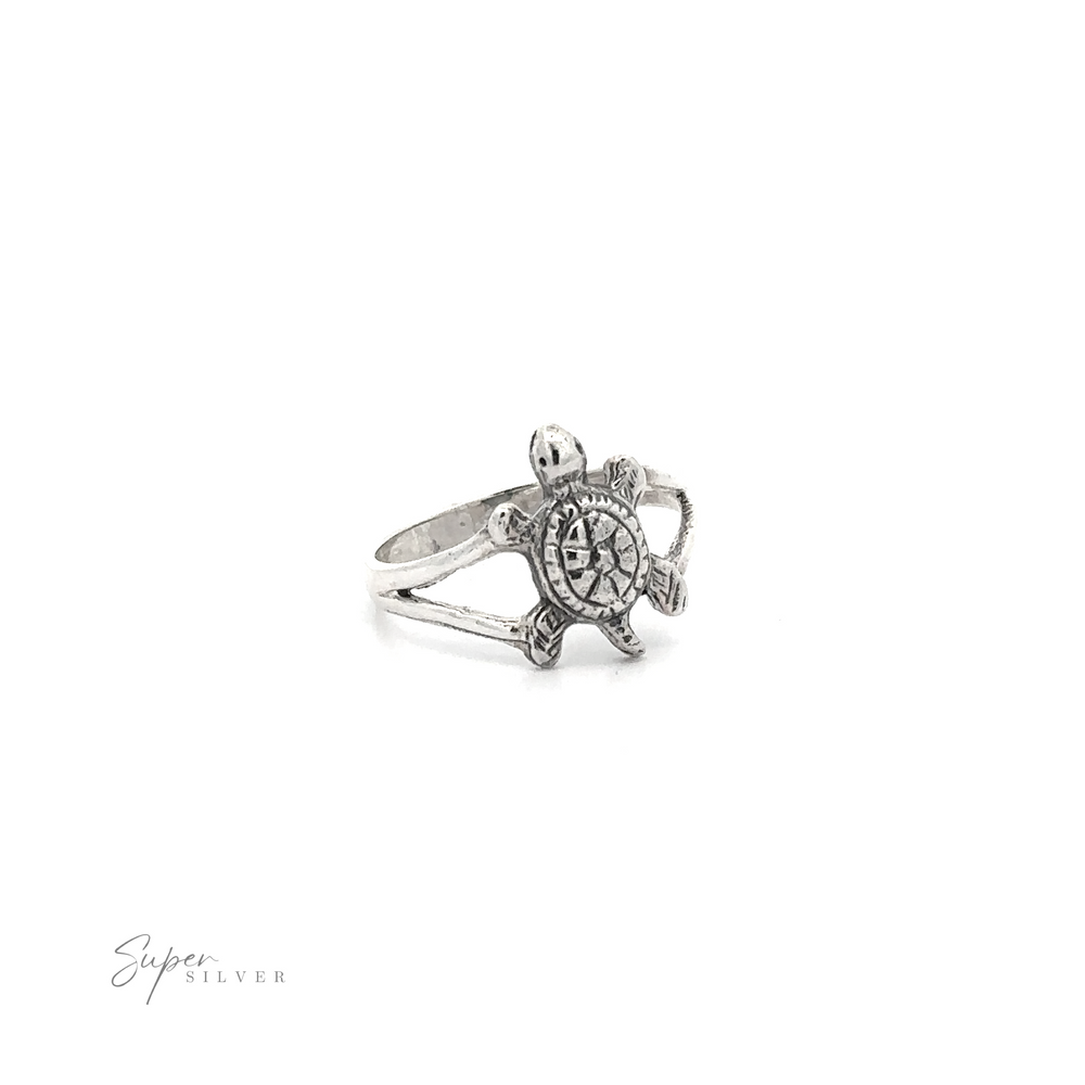 
                  
                    A Small Turtle Ring with a sleek band on a white background.
                  
                