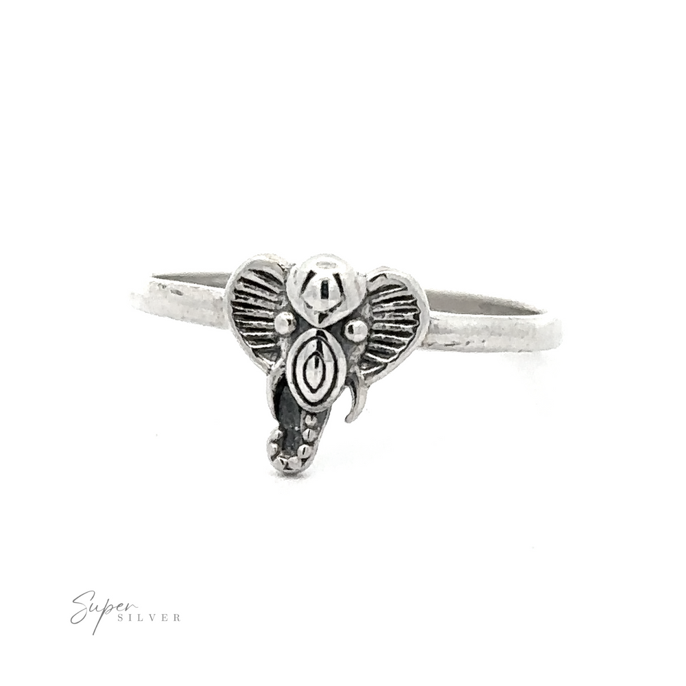 Sentence with the replaced product name:
Silver ring made of .925 Sterling Silver, featuring a Tribal Elephant Head Wire Ring design with heart-shaped ears and decorative elements.