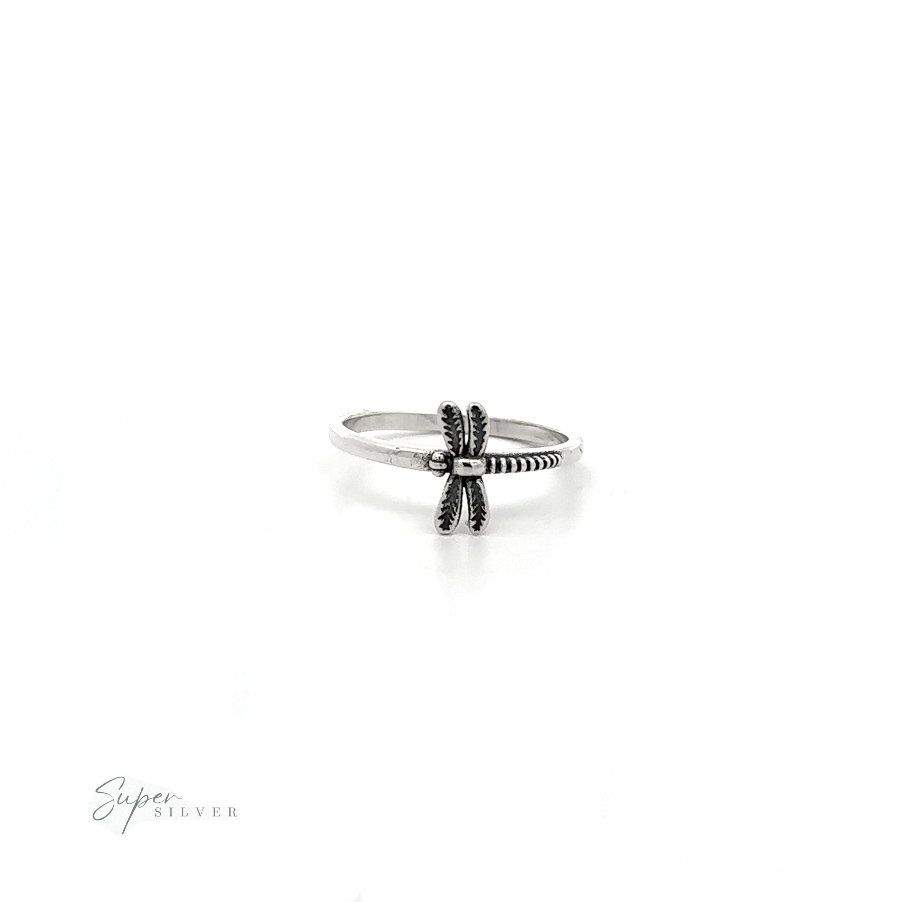 A Dainty Dragonfly Ring on a white background.