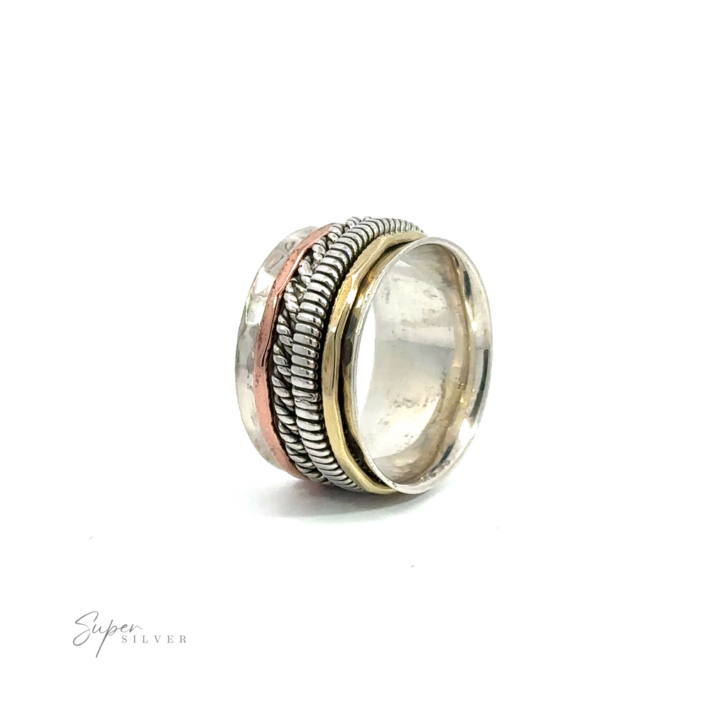 A Handmade Spinner Ring with Two Rope Styled Bands on a white background.