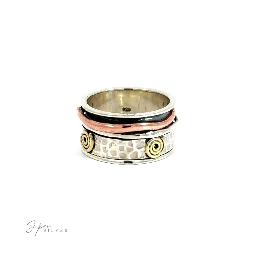 
                  
                    A hammered silver band with gold spiral accents, creating a unique and elegant Handmade Spinner Ring with Copper and Gold Spirals.
                  
                