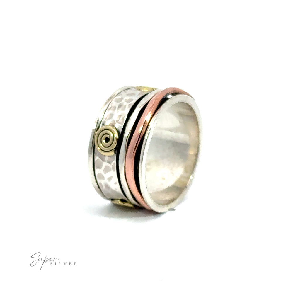 A silver and rose gold Handmade Spinner Ring with Copper and Gold Spirals.