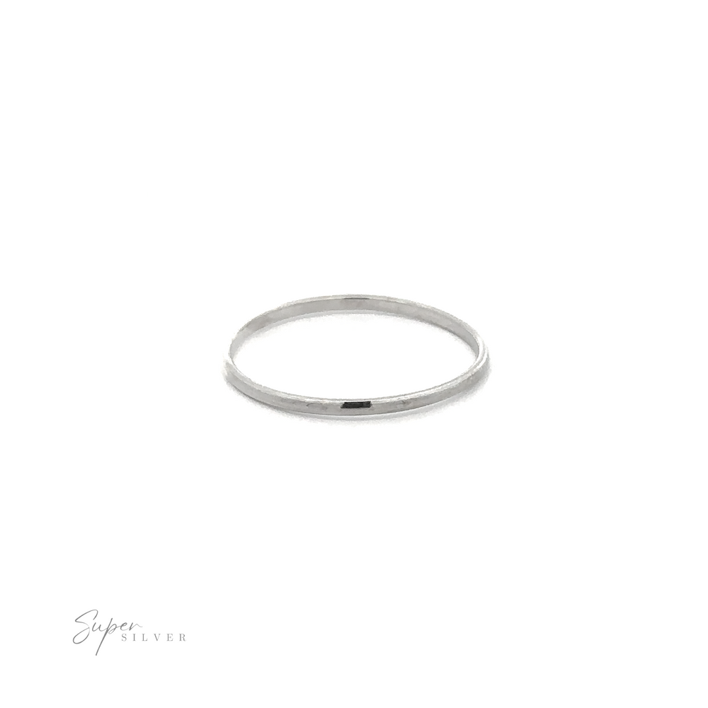 A delicate and minimalist 1.2mm Plain Bands midi ring on a white background.