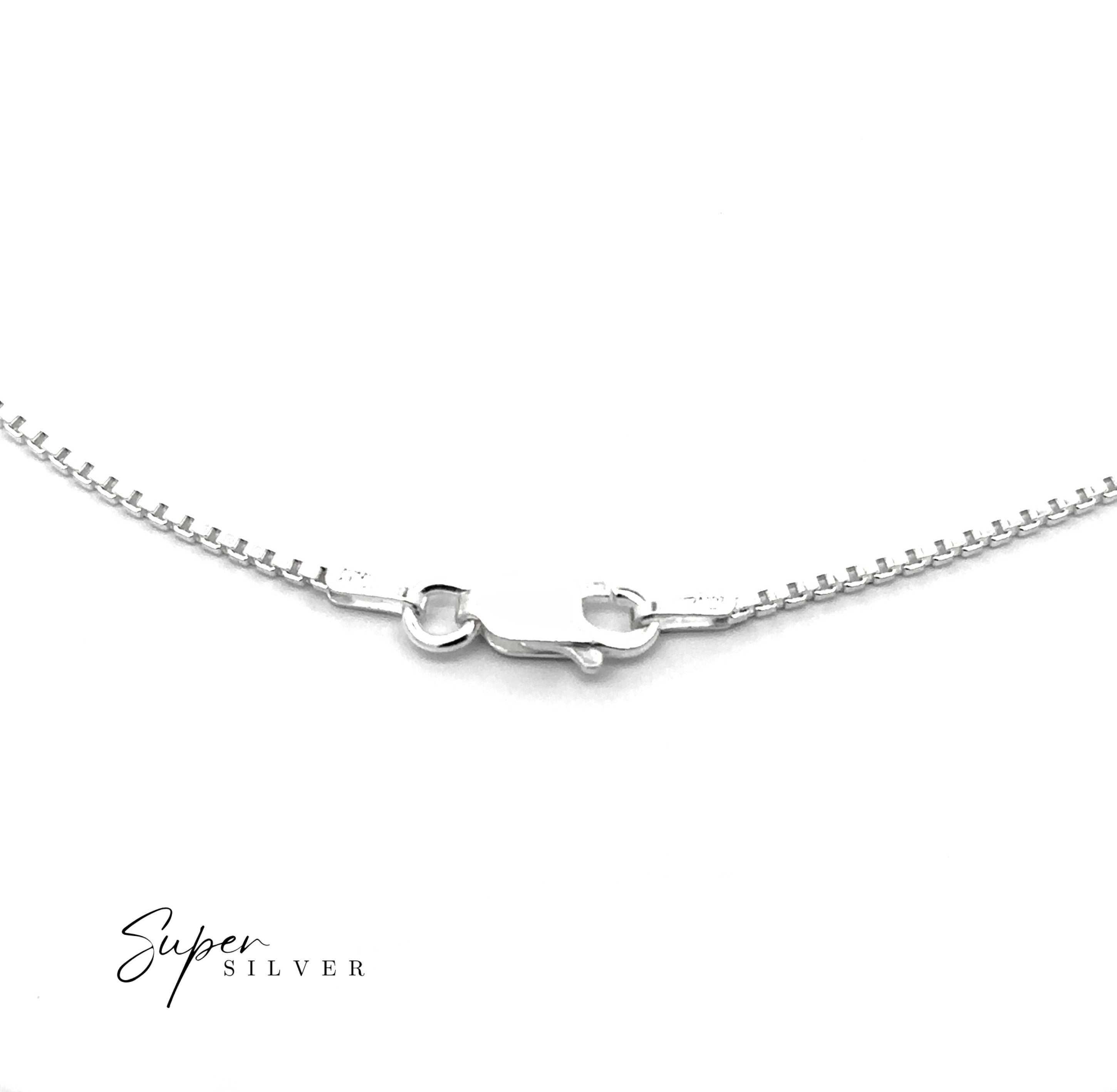 Close-up of the Italian Edge Box Chain, a men's minimalist necklace with a lobster clasp, showcased on a white background. The "Super Silver" logo is visible in the bottom left corner.